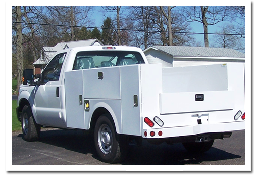 Stahl utility service body on a white pickup truck